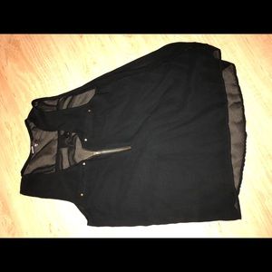 Woman’s sheer black top